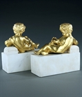 Picture of CA0352 Decorative pair of Louis XVI style gilt bronze reclining cupids on marble