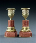 Picture of CA0336 Decorative pair of Louis XVI ormolu and rose marble candlesticks