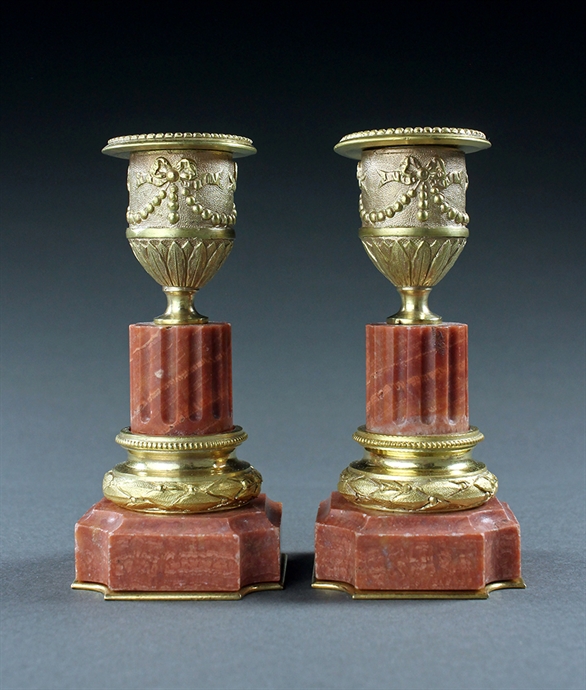 Picture of CA0336 Decorative pair of Louis XVI ormolu and rose marble candlesticks