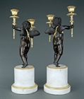 Picture of CA0288 Substantial pair of 19th century bronze winged putti candelabra