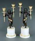 Picture of CA0288 Substantial pair of 19th century bronze winged putti candelabra