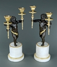 Picture of CA0288 Substantial pair of 19th century bronze winged putti candelabra