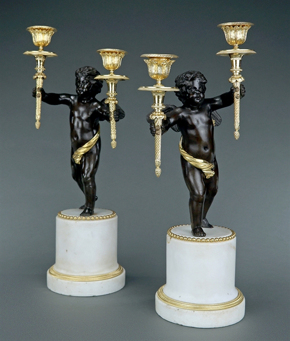 Picture of CA0288 Substantial pair of 19th century bronze winged putti candelabra