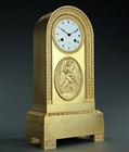 Picture of CA0208 French Empire Cronos ormolu borne mantel clock